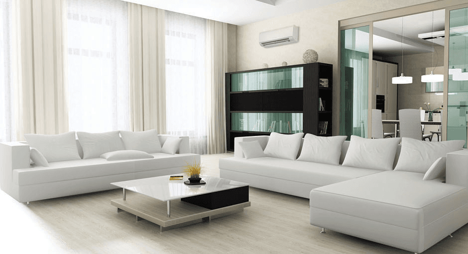 Mitsubishi Electric mini split head unit mounted above a media console in a modern living space