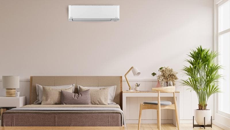 Wall-mounted mini split head unit installed in a living space